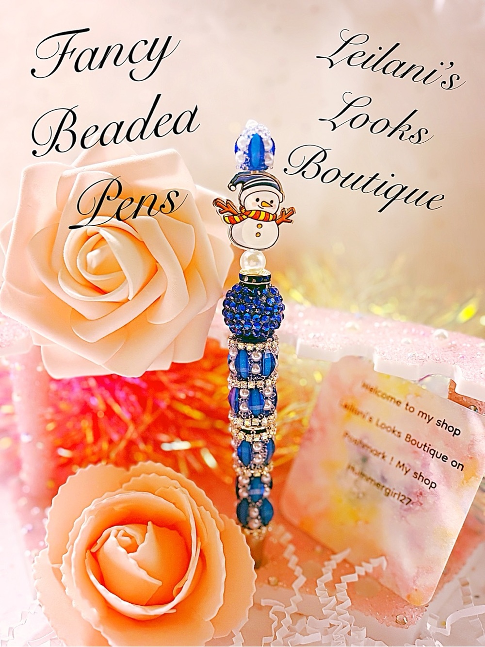 Blue & silver beaded snowman charm pen with blue & silver beads and a snowman/